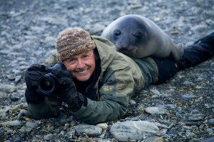 Art wolfe and a Southern elephant seal weaner, South Georgia Island